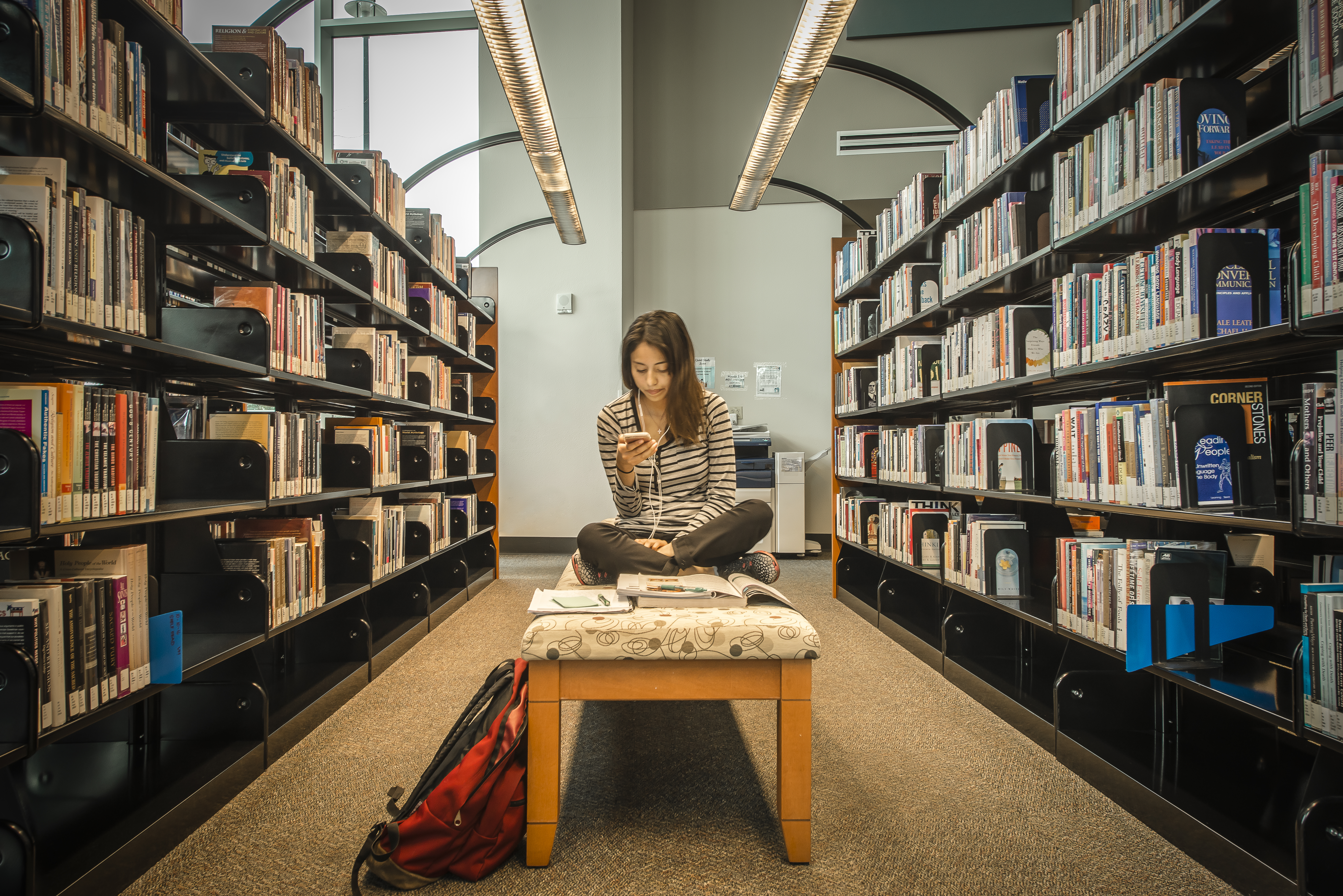 Student studying in Charleston Campus library 